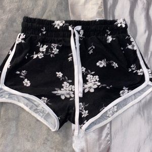 black with white flowers shorts